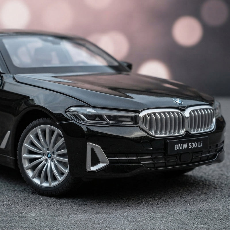 Close-up of the multi-layer black finish and detailed metallic craftsmanship on a Black Mamba diecast model car.